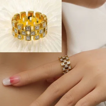 2023 חדש מעולה בלינג נירוסטה זהב צבע לבן זרקונים רשת חלולה הטבעת איכות גבוהה תכשיטים עדינים.