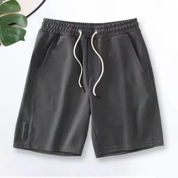 מסוגנן גברים המכנסיים כיסים בקיץ מכנסיים קצרים בצבע אחיד באורך הברך גברים מכנסיים ספורט